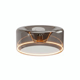 LED-Donut-Lampe E27 aus Rauchglas, Ø 195 mm, eingeschaltet, warmer Lichtring, weißer Hintergrund